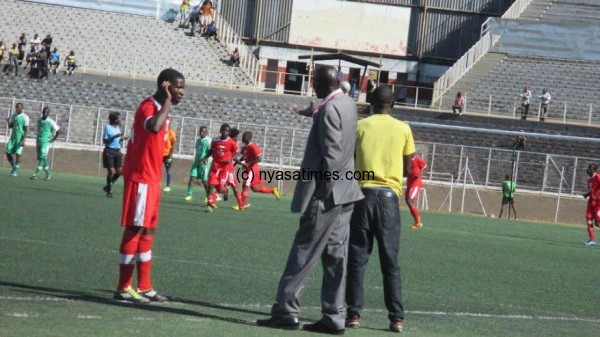 Mpulula giving instructions on the touchline