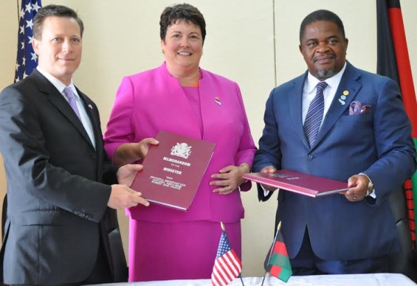 Msaka, Palmer and showing the Power Africa MOU