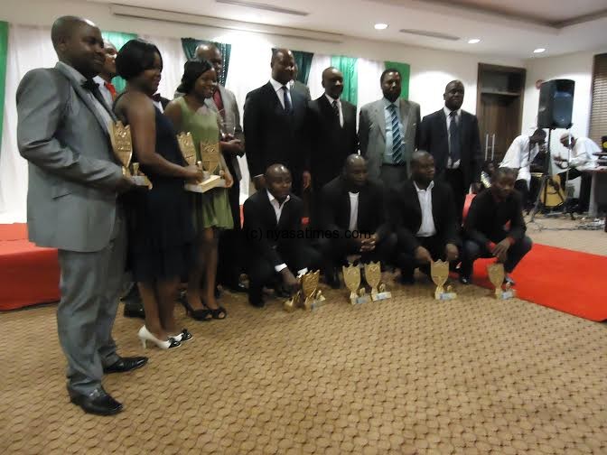 Muluzi with the awarded environmental journalists