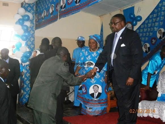 Mutharika greets one of the candidates