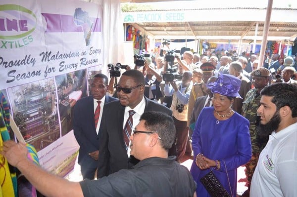 Mutharika on one of the stands at the trade fair: Thinking business