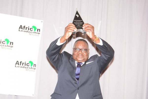 Mutharika showing his award