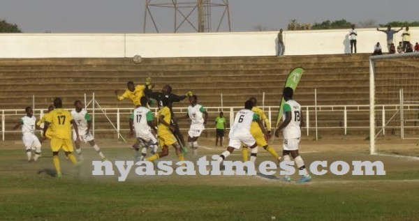 Mzuni goalie Rabson Chienda parries the ball away, Pic Alex Mwazalumo.