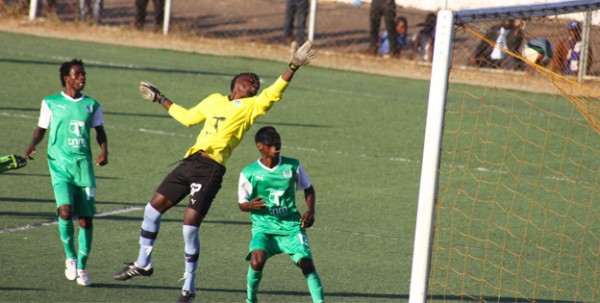 Mzuni goalkeeper Radson Chienda could not get any help from his defenders.-Photo NyikaSports