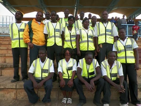 New stewards pose with Sulom's Aggrey Khonje (in track suit) at Silver Stadium in Lilongwe