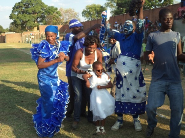 Nomads fans celebrating their teams' victory. Photo by Elijah Phimbi, Nyasa Times