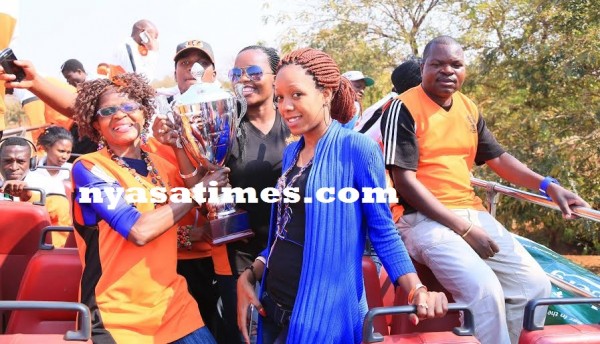 Nomads parade the Carlsberg trophy -Photo Jeromy Kadewere