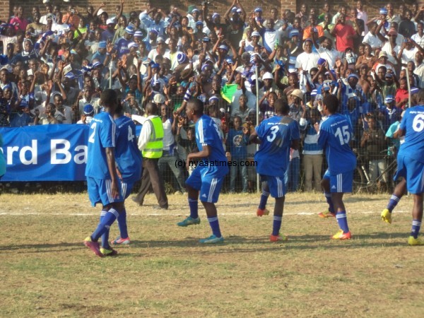 Nomads players celebrating a goal. -Photo by Elijah Phimbi, Nyasa Times