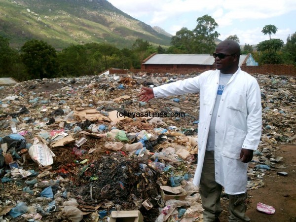 Ntcheu District Deputy Environmental Health Officer Lusciuos Donsa at Waste Disposal Site at Ntcheu Market Centre