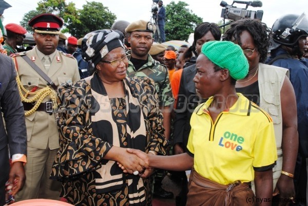 One love; President Banda assures the lady of her support
