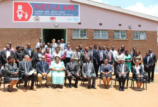 Participants at the openingof the Child Justice Court pose for a group photograph (C) Stanley Makuti