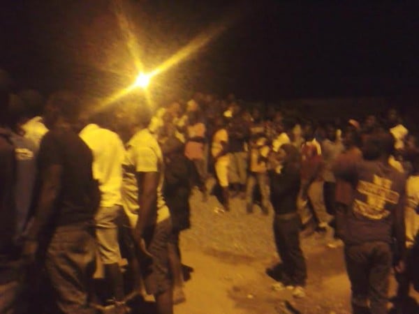 People looking at the mystery fire in Mzuzu