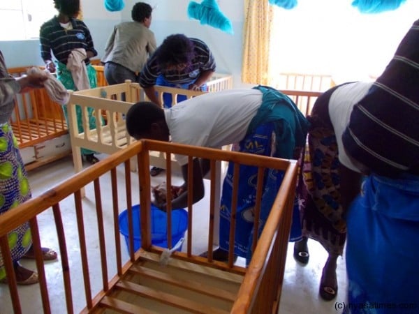 Players cleaning one of the rooms for the kids....Photo Jeromy Kadewere