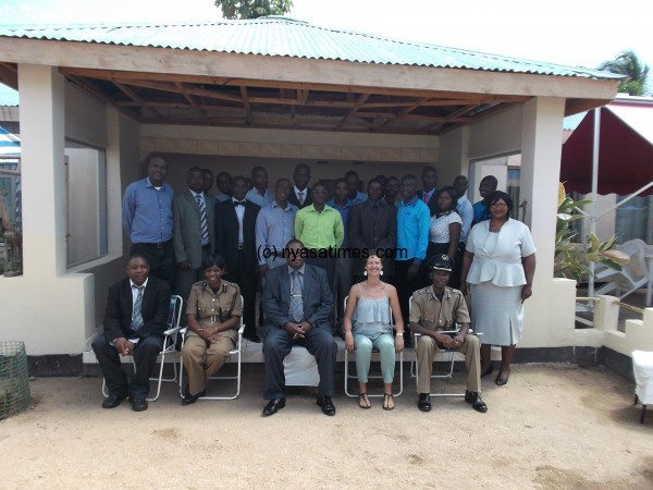 Police Training group photo_ (C) is Wilsom Matinga and second from (R) is Joanna Seth Smith pose with the  police officers