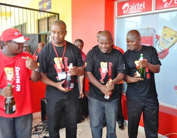 Poping the champaigne doe Airtel....Photo Jeromy Kadewere