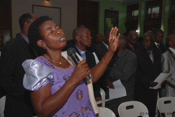 Praying for President Joyce Banda.- Photo by Govati Nyirenda, Mana.