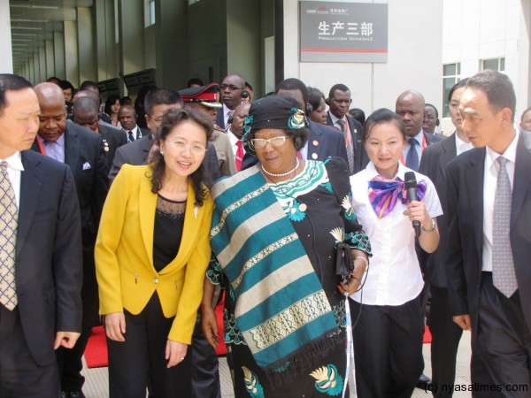 President Banda being conducted through the HONGYUNHONGE Group factory