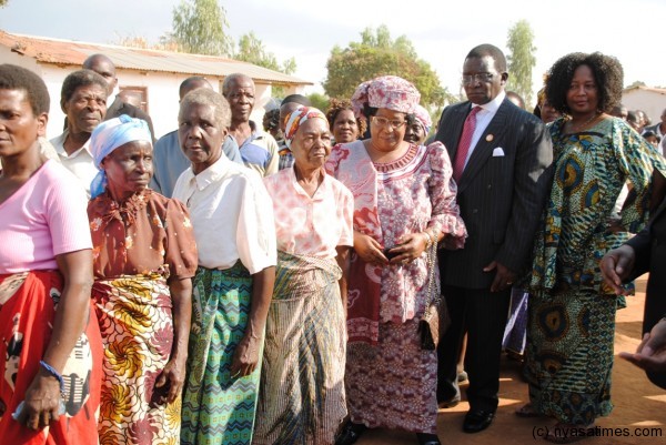 President Banda, the First Gentleman and the President's sister, Anjimile line up to register as voters in Zomba
