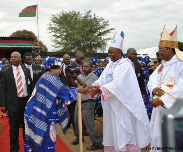 President Banda congratulates Bishop Martin Mtumbuka during his priestly ordination silver jubilee, Pic by McCarthy Mwawamba, Mana