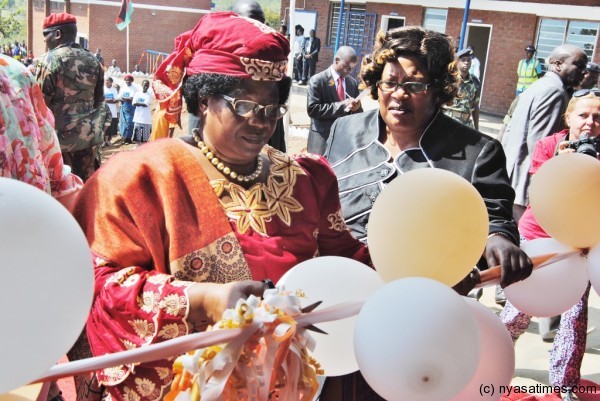 President Dr.Joyce Banda cuts the ribbon to officially open the Majete 1 Epicentre in Chikhwawa.Picture by Francis Mphweya-MANA.