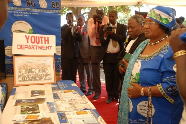 President Joyce Banda view pavillions mounted at the 80th annivesary celebrations of St Columba Church of the CCAP in Blantyre