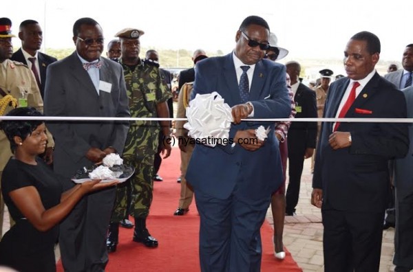 President Mutharika accompanied by Hon ... pping Mall - Pic by Stanley Makut