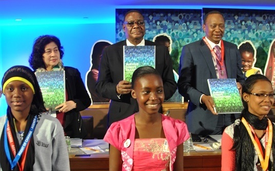 President Mutharika and his Kenyan counterpart Uhuru Kenyatta pose with the girls - Pic by Edson Mwamvani