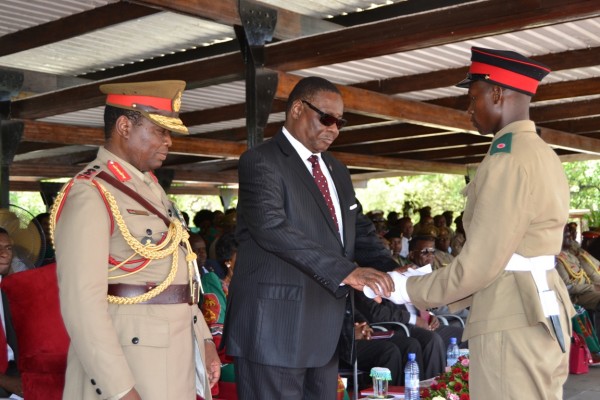 President Mutharika and the Commander of Malawi Defence Force General Ignasio Maulana Commissions one of the Officers on at MAFCO in Salima (C)Stanley Makuti