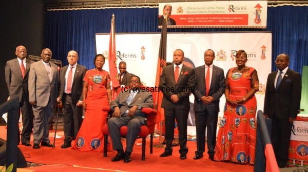 President Mutharika in a group photo with the commissioner... - Pic by Stanley Makuti