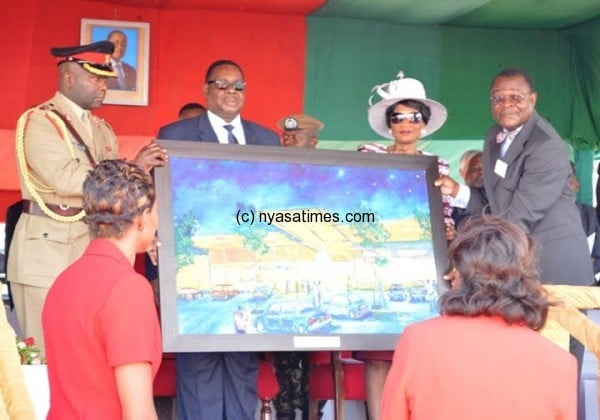 President Mutharika receives the gift from MPICO - Pic by Stanley Makuti.