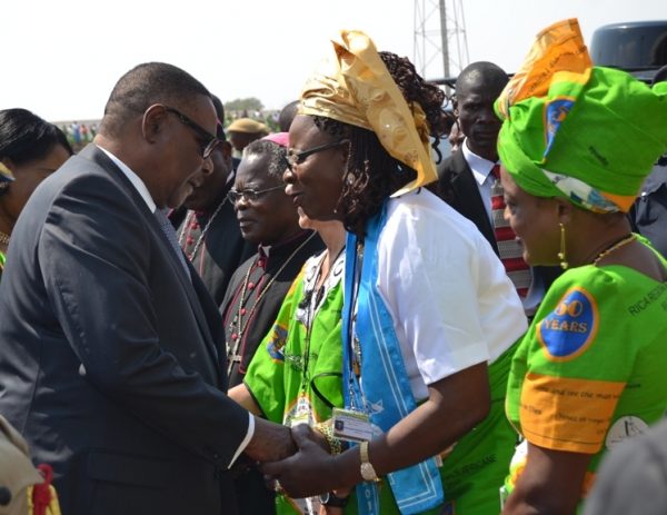President Peter Mutharika being welcomed by president of World Union of Catholic Women Organisation(WUCWO) Mrs. Rosaline Menga at Civo Stadium, Lilongwe(c) Abel Ikiloni, Mana