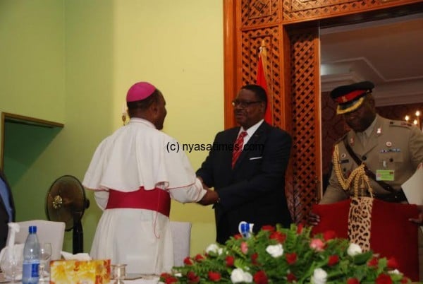 President Peter Mutharika greets Bishop Stima at Sanjika  Palace.(C)govati nyirenda.
