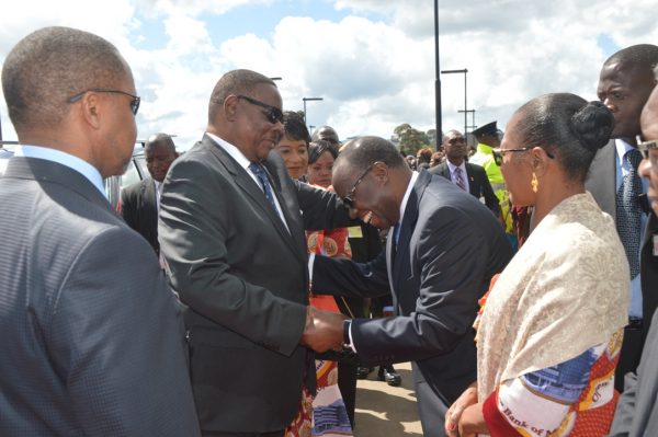 President Peter Mutharika is welcomed by the Reserve Bank Governor Charles Chuka on arrival at Reserve Bank Mzuzu Branch (C)Stanley Makuti