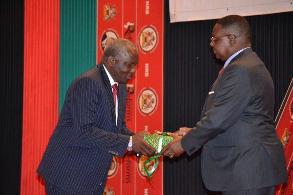 President-Peter-Mutharika-presents-Nationa-ID-to-Speaker-of-Parliament-Richard-Msowoya