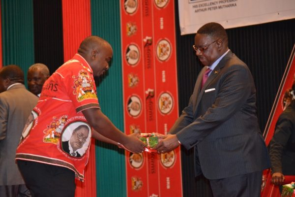  President-Peter-Mutharika-presents-a-National-Identity-card-to-Inkosi-Ya-Makhosi-Mmbelwa