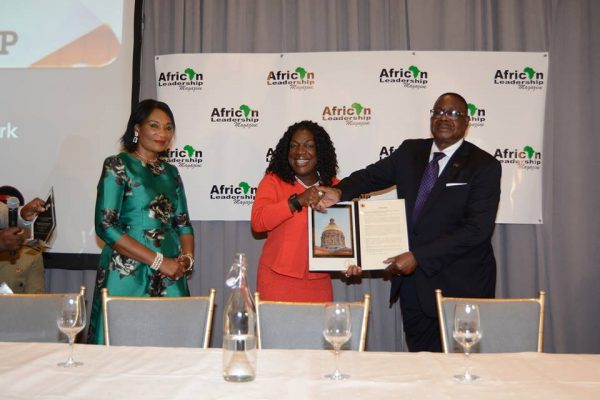 President Peter Mutharika receiving the award for exceptional leadership