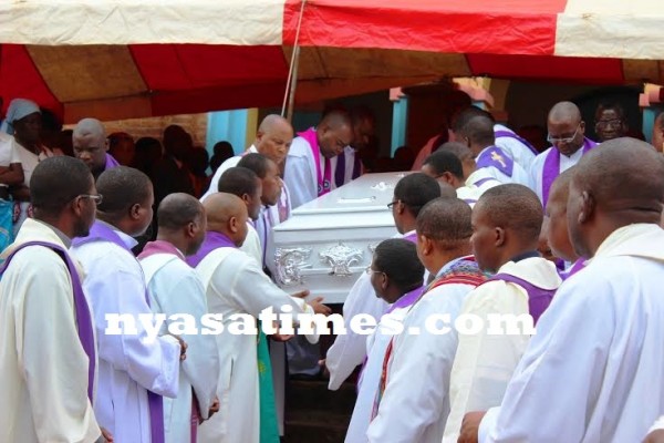 Priests carrying the casket...Photo Jeromy Kadewere.