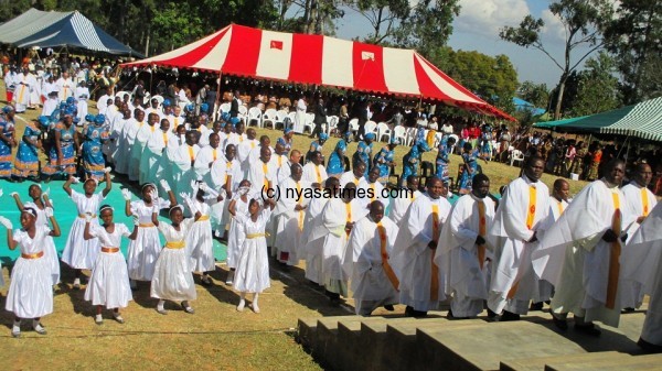 Priests walking in a role ready for the mass.....Photo Jeromy Kadewere