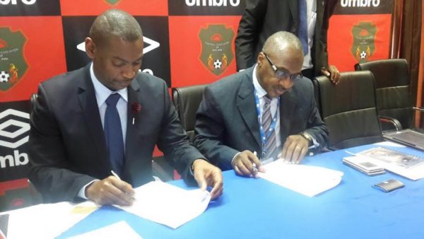 Putting pen to paper: FAM president Nyamilandu and FDH Bank boss Outtara