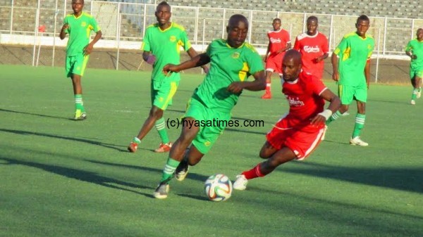 Rat and cat chase, as Mlozi tries to win the ball....Photo Jeromy Kadewere.