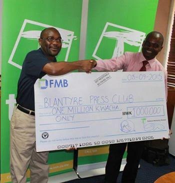 Receiving the donation for Blantyre Press Club