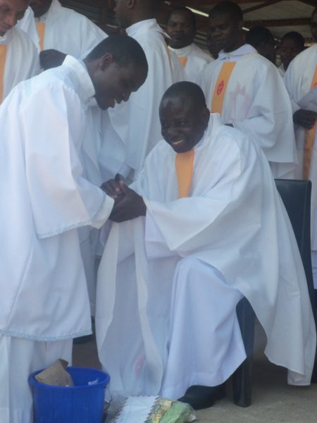 Rev. Fr Ignatio Yohane being greeted by fellow priests