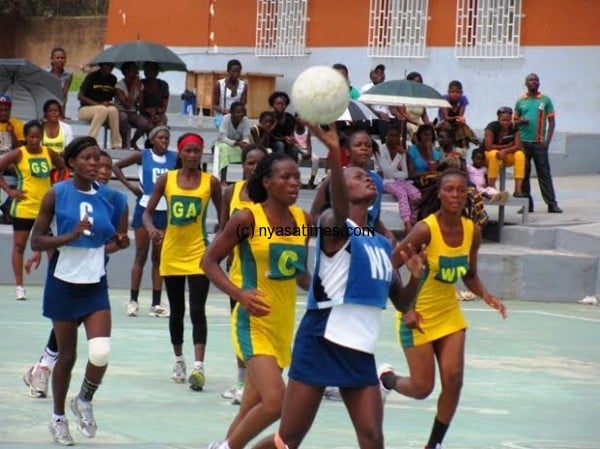 Riana Mtenje holds the ball as other players looks on...Photo Jeromy Kadewere