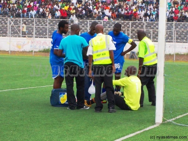 Richard Chipuwa receving first aid.-Photo By Jeromy Kadewere