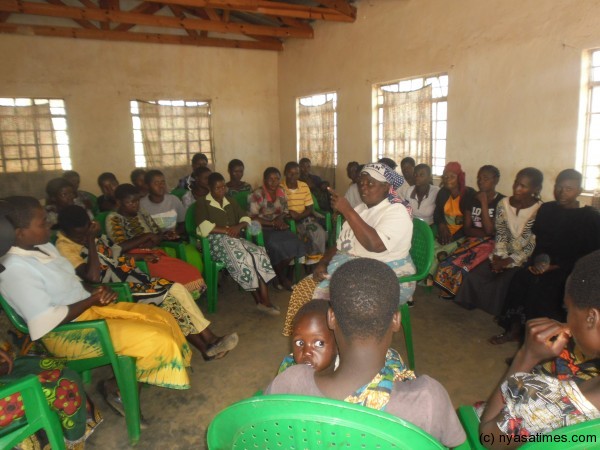 Senior Chief Chitera lecturing the beneficiaries how best to make use of the money