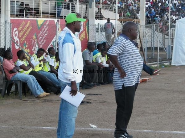 Silver Coach Stain Chirwa and TM Francis Songo follow the proceedings.