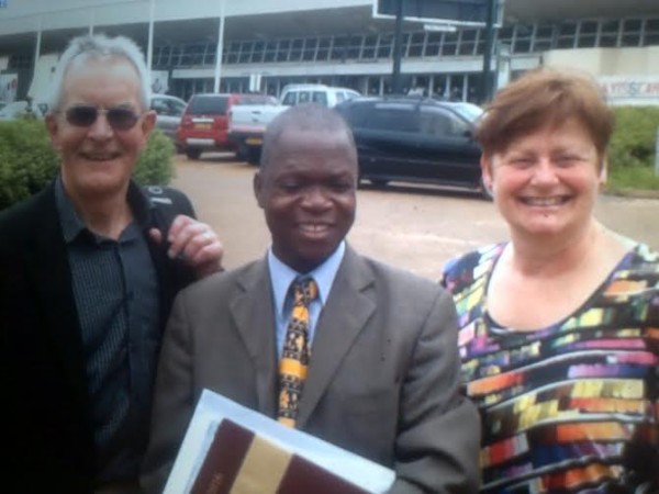 Sir Peter Fahy, Charles Gwengwe, and Maggie soon after landing at the KIA