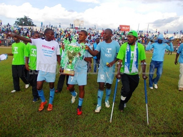 Silver players parade the league trophy.-Photo by Jeromy Kadewere/Nyasa Times