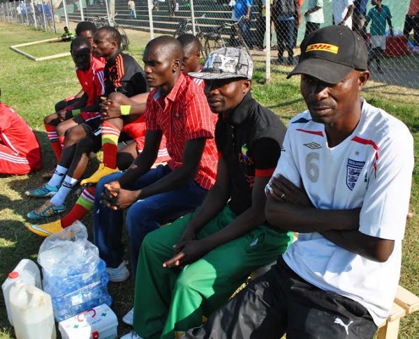 Sombre faces at Max Bullets bench with coach Nankhuni in England jersey....Photo Jeromy Kadewere