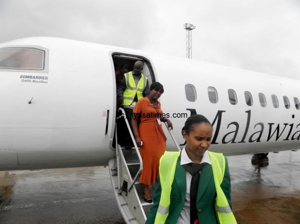Some of Malawian Airlines staff members alighting from the plane- Pic Lucky Mkandawire